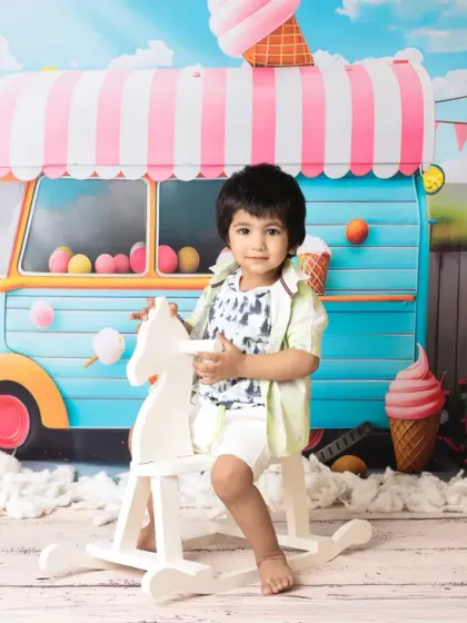 The ice cream truck theme is a hit with older kids too. These photos capture the pure happiness and excitement of a summer day treat.