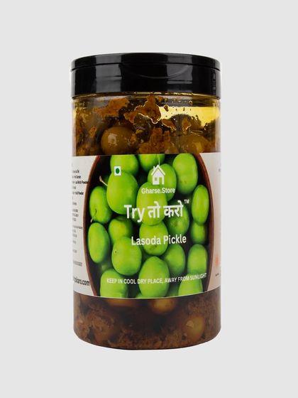 A larger jar of Lasoda Pickle, isolated on white.
