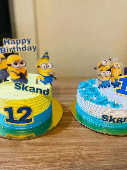 Two matching Minions cakes, perfect for a joint birthday celebration or a party with lots of guests.