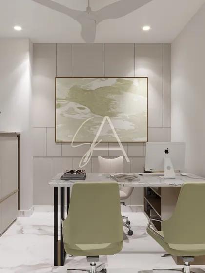 This compact cabin design demonstrates how we maximize smaller spaces. A clean, white and sage green color scheme, wall-mounted storage, and a minimalist desk create a workspace that feels spacious, organized, and serene.