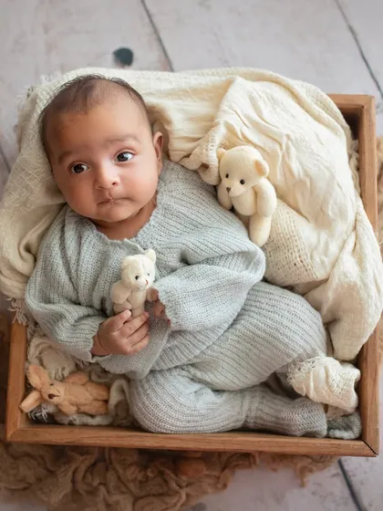 Another shot of the little man, this time holding his tiny teddy bears. He was so alert and calm during his solo portraits.