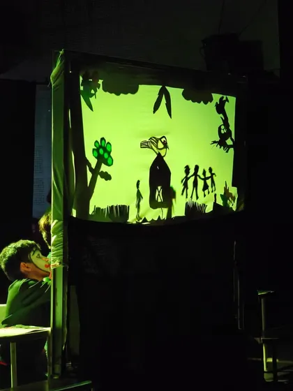 Storytelling takes many forms here. Our children's workshops explore diverse theatrical arts, including the enchanting world of shadow puppetry. The kids learn to create characters and narratives using light and shadow, a truly magical experience.