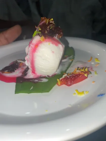 My signature Paan Vanilla Ice Cream. A scoop of vanilla ice cream served on a fresh betel leaf with gulkand and colorful sprinkles.