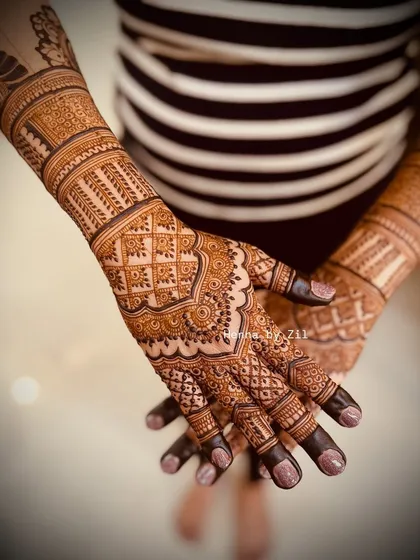 A beautiful, dense bridal design with classic checkered patterns and scalloped borders.