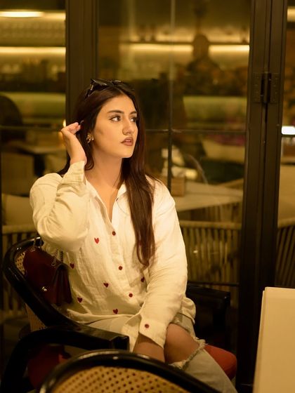 Looking away thoughtfully, enjoying my own company at Cafe Grass.