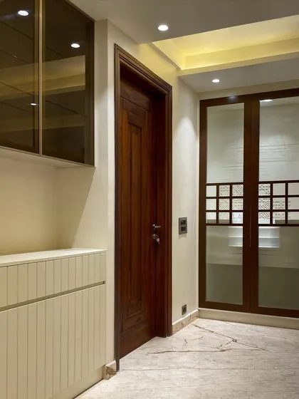 This view shows how we integrate different functional units like the crockery cabinet and the home temple into the main living area, ensuring a cohesive and uncluttered look.