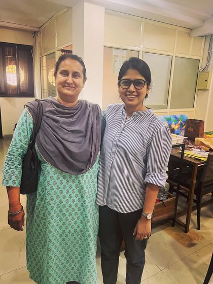 Posing with one of the parents from our art community. We're so grateful for the support of all the families.