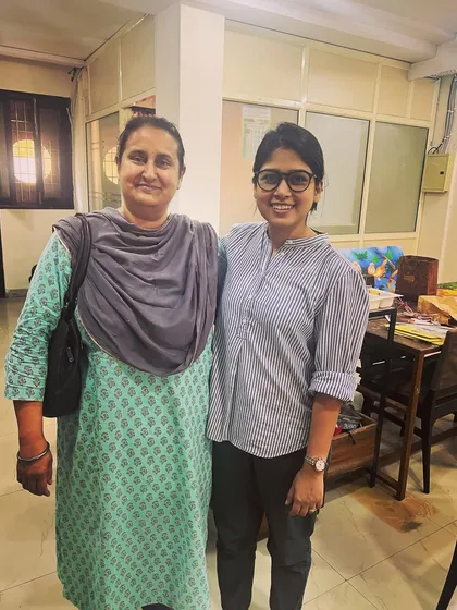 Posing with one of the parents from our art community. We're so grateful for the support of all the families.