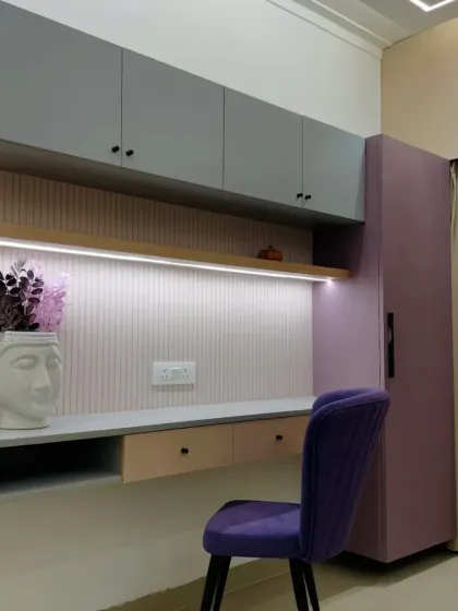 Another view of the modern study nook, highlighting the under-shelf lighting which provides excellent task illumination.