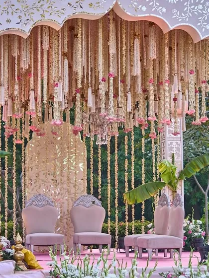 I believe a mandap should feel like a sanctuary. For this ceremony, I designed a structure that felt both grand and intimate, with a waterfall of tuberose and roses descending from a hand-detailed arch, framed by sacred banana leaves to bless the union.