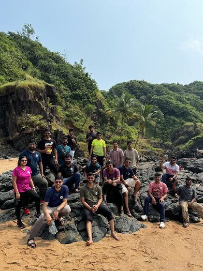 A group photo on the rocky shores of a Gokarna beach during our long weekend trip.