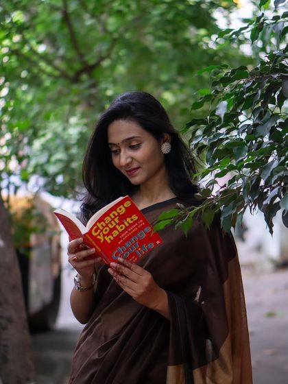 Finding wisdom in books. A shot from a lovely outdoor photoshoot.