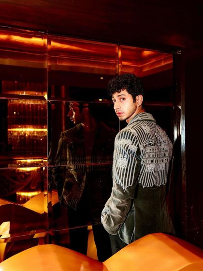 Mihir Ahuja in our grey velvet coat, a piece that is the epitome of sophistication and luxury. The embroidered details are an ode to meticulous craftsmanship.