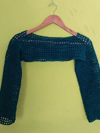 My mesh sleeves or shrug in a beautiful bottle green. This is a great piece for layering over tops and dresses.