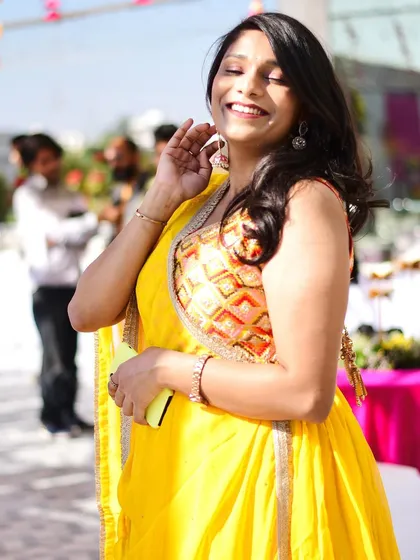 Soaking in the sun and the happy vibes at a Haldi ceremony. I truly believe I get more excited for your wedding than your own relatives, and my smile says it all.