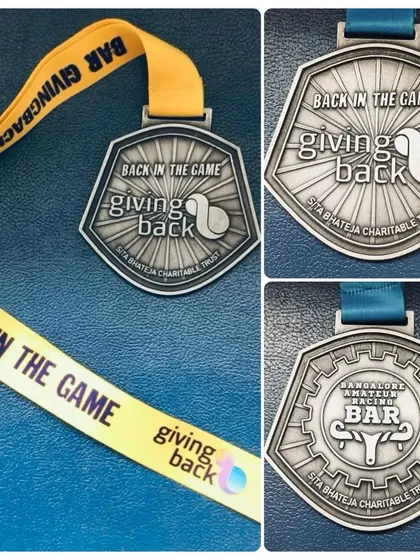 This isn't just a medal; it's a symbol of making a difference. Every participant at our 'Giving Back' fundraiser event takes one home, representing their contribution to a great cause and a victory we all share.