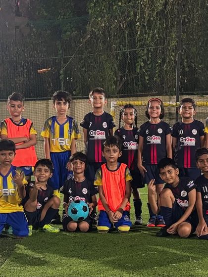 Both teams posing together after a competitive practice match. We value sportsmanship and building positive relationships with other academies.