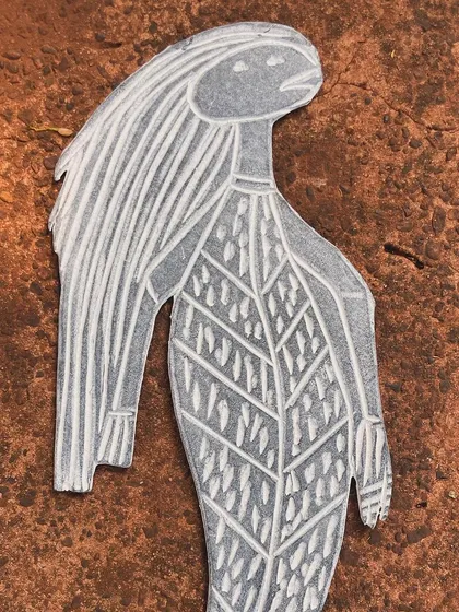 This is the story of a Yawkyawk (young woman mermaid) design by artist Janet Marawarr. Her original lino tile is being carefully translated into a woodblock by our carvers, preserving the story for our collaborative textile collection.