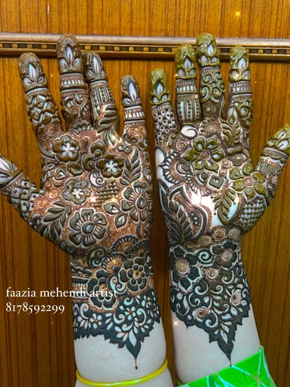 A beautiful bridal design with a mix of bold and fine lines. The wrist cuff is particularly detailed.