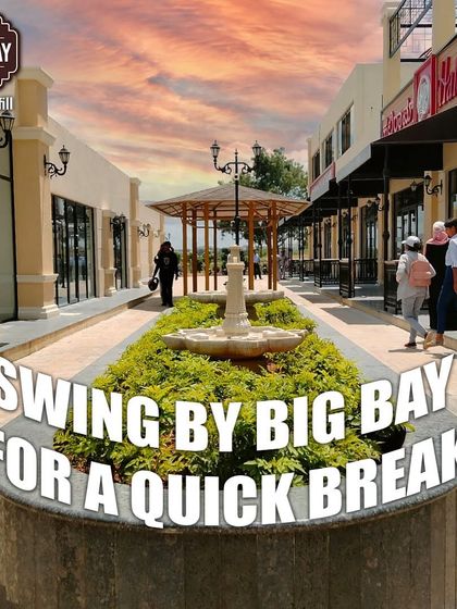A welcoming shot of our central courtyard with its fountain and greenery, inviting you to swing by for a quick and pleasant break.