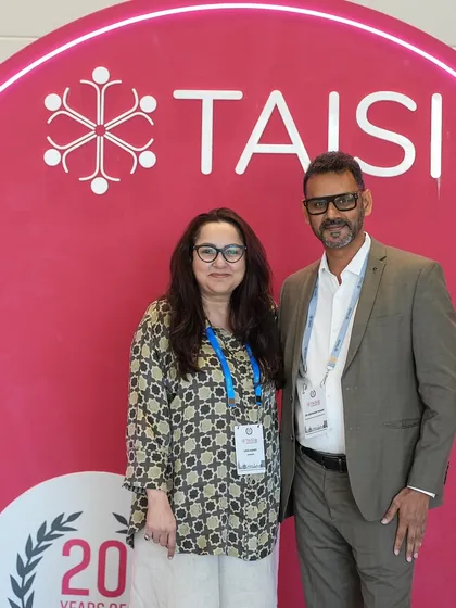 Posing with educator Lina Ashar at the TAISI conference. Collaborations like these are essential for blending different expertises, from neuroscience to conscious parenting, to create a more comprehensive approach to education.
