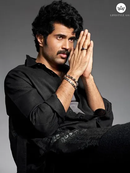Another look from the Lifestyle Asia shoot, showcasing a relaxed yet intense mood. The all-black outfit from his brand Rowdy Club serves as a canvas for the striking Men of Platinum accessories.