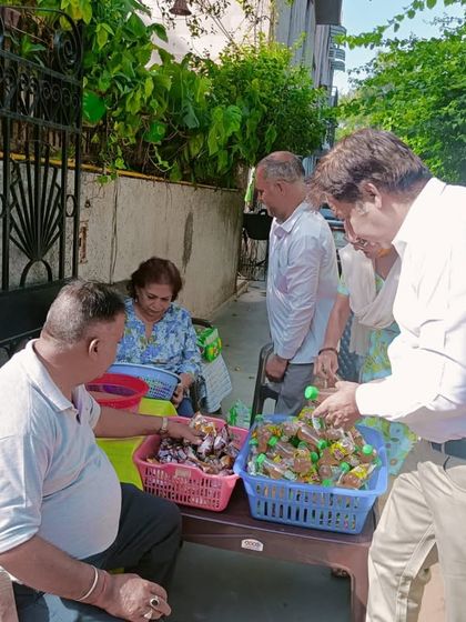 Helping to pack and distribute goodies. Small acts of kindness create ripples of happiness.