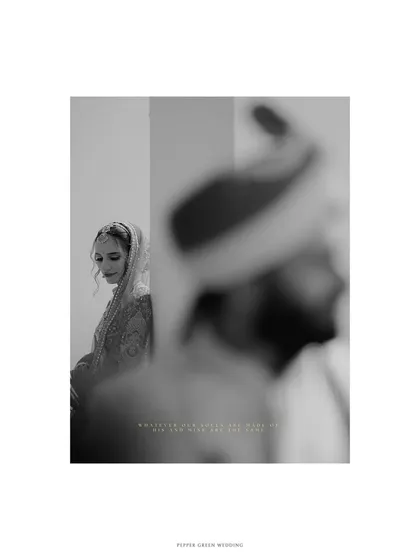 An artistic black and white shot capturing the bride's anticipation, with the groom out of focus in the foreground.