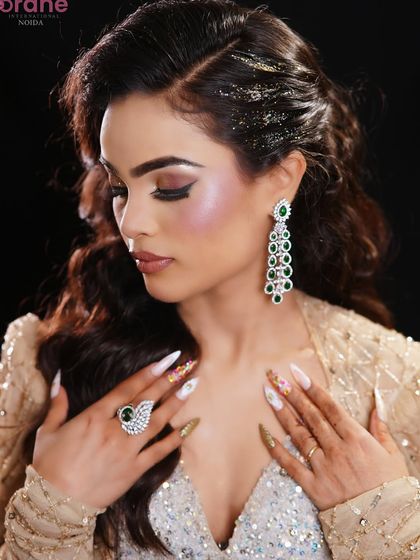 This shot captures the essence of "more is more" glamour, with glittery hair, bold makeup, and statement jewelry.