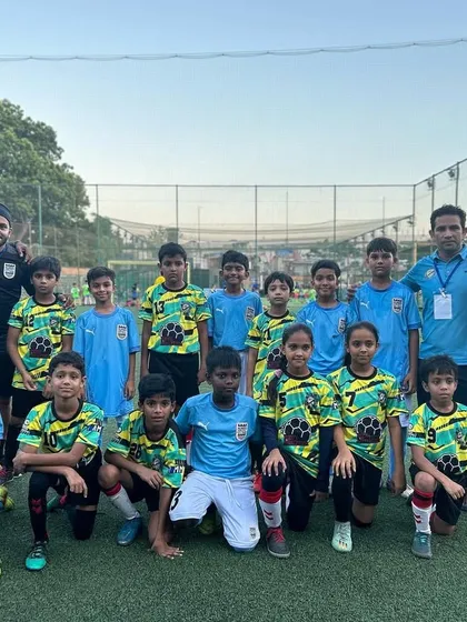 A formal pre-match photo of our U-10 team with the coaches for the MCFC Grassroots League. We prepare our players for a professional football environment.