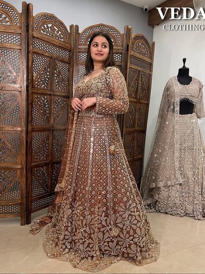 This angle shows another mannequin in the background, giving you an idea of the variety of pyare-pyare lehengas available in my collection.