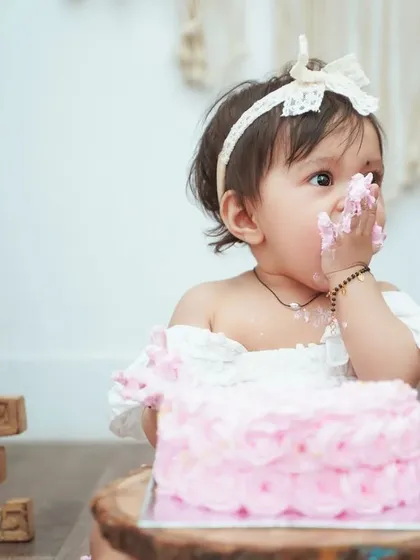That first taste of birthday cake is a moment to remember! I love capturing their reactions as they explore the new texture and flavor.