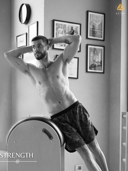 Building resilience and power on the Ladder Barrel. This practice strengthens the back and core muscles while fostering balance and tranquility.