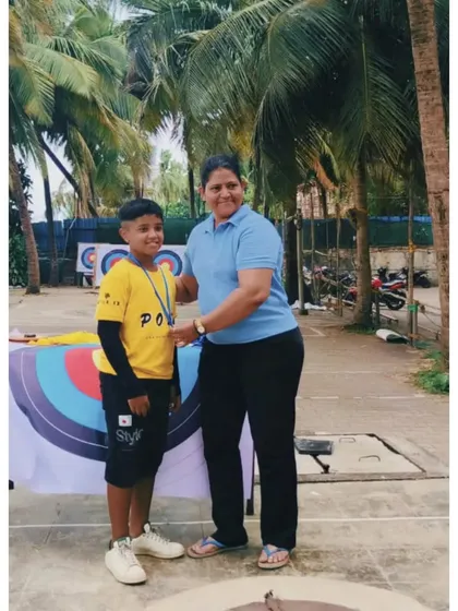An Under 9 archer proudly receiving his medal. These kids are the future of our academy.