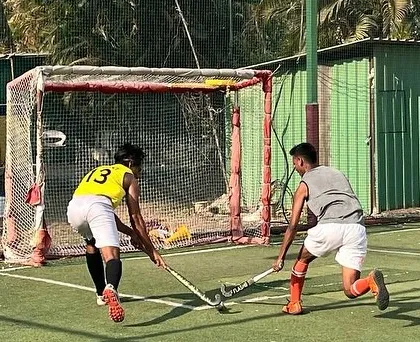 An attacker attempts to score while the defender tries to block the shot. This is a great drill for practicing goal-line situations.