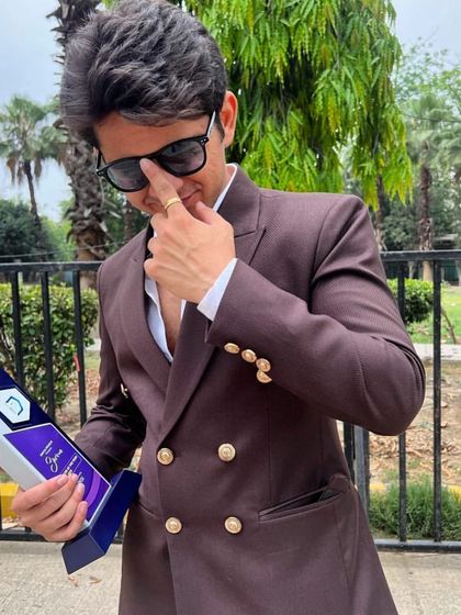 A creator of the year, looking the part in a custom double-breasted brown suit. It's always a pleasure to dress successful and confident individuals.