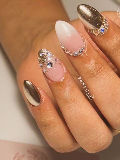 A close-up of the bridal set, showing the detail of the gold chrome, ombre, and meticulously placed rhinestones.