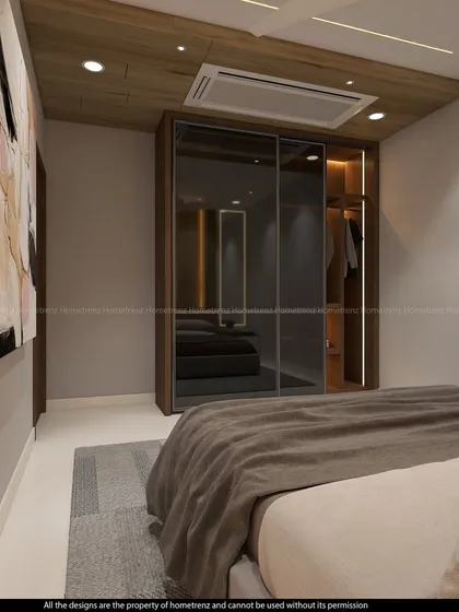 Another view of the guest bedroom wardrobe, showing the clean integration with the wooden ceiling panel.