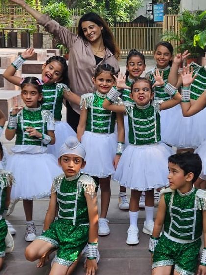 Our youngest performers looking proud and happy in their costumes after their big moment. We make sure even our little stars feel confident and celebrated during our annual recitals.