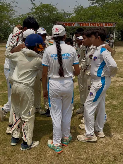 Our female captain leading the team huddle. We believe in leadership from everyone.