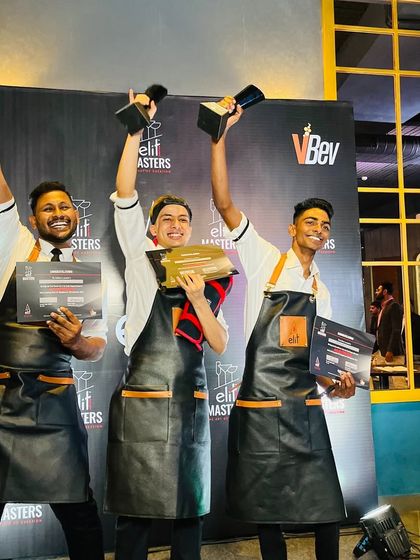The winners of the ELIT Masters 2023 South Regional Round, with our bartender Swaroop proudly holding his trophy.