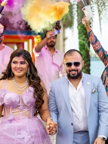 What a fun entrance! For Kajol's sundowner party, we went with a fresh and luminous look that would pop against her gorgeous lilac gown and last through all the celebrations, including this amazing color blast.