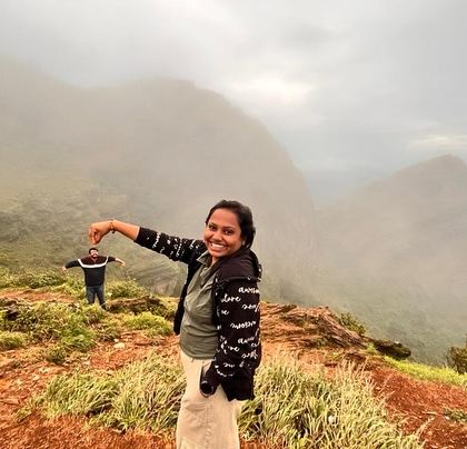 A fun, forced-perspective shot from our Chikmagalur trip, with the misty Western Ghats in the background.
