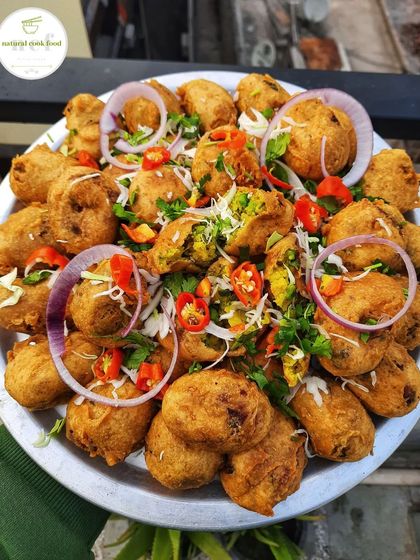 A platter of my delicious Aloo Chop, garnished with fresh chillies and onions. A perfect savory snack for any time of day.