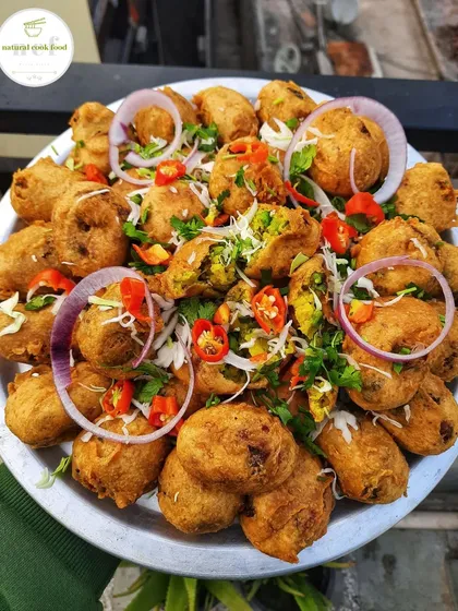 A platter of my delicious Aloo Chop, garnished with fresh chillies and onions. A perfect savory snack for any time of day.