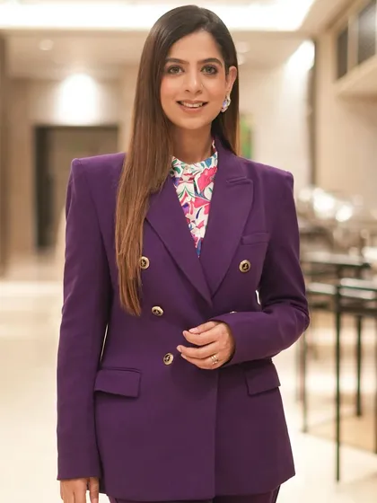 Another portrait in my purple power suit. I believe in dressing for the job you want, and for me, that's commanding the stage.