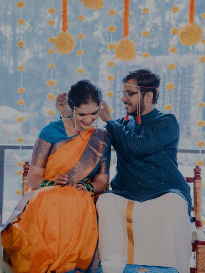 A tender moment during a traditional Maharashtrian pre-wedding ritual. We capture the quiet, intimate customs that are full of meaning.