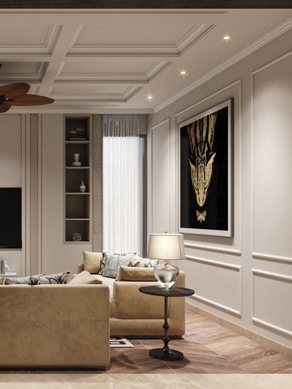 A family lounge concept where neoclassical wall mouldings and a coffered ceiling are paired with comfortable, modern furniture. A large piece of art adds a bold, contemporary touch.