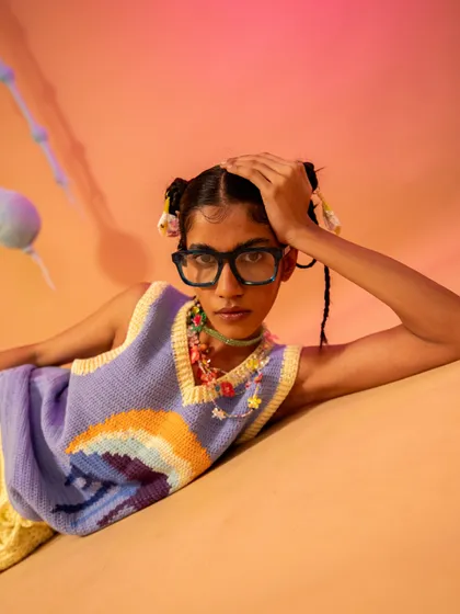 Another look from the Ratalove shoot, featuring a knit vest and quirky glasses. This highlights my skill in creating bold, colorful, and character-driven looks for brands.