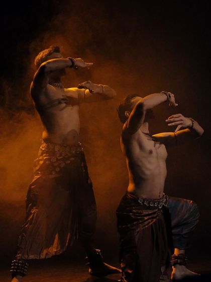 Two dancers, one form. A pose from 'ATAH' that showcases the physical connection and trust between partners in a duet.